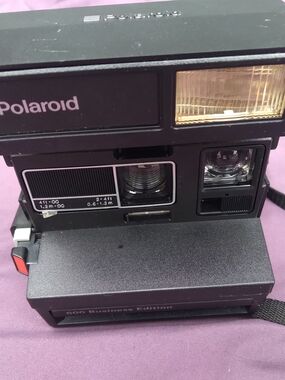 Polaroid Black Instant Camera with Gold Flash Accent